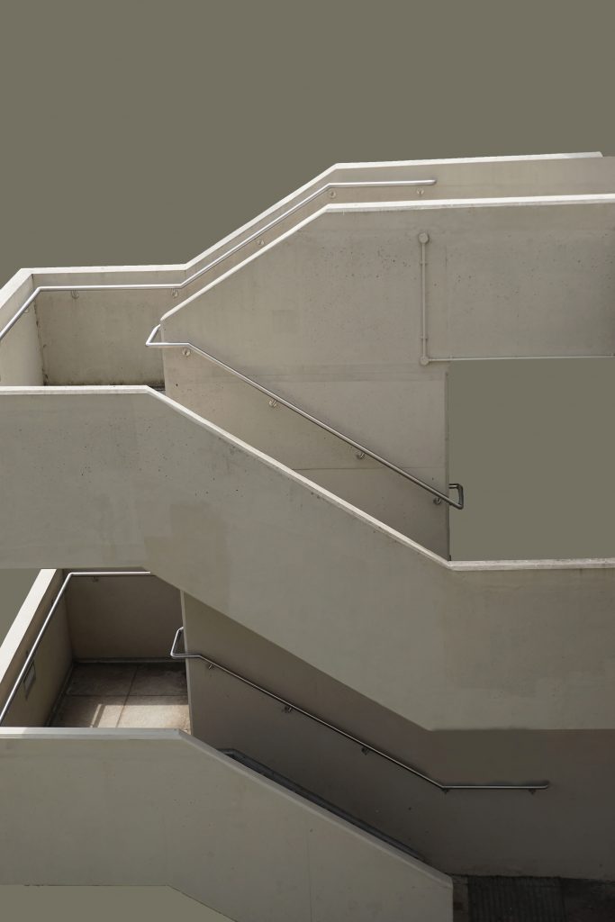 Edward Ray - A concrete staircase on a grey-green background