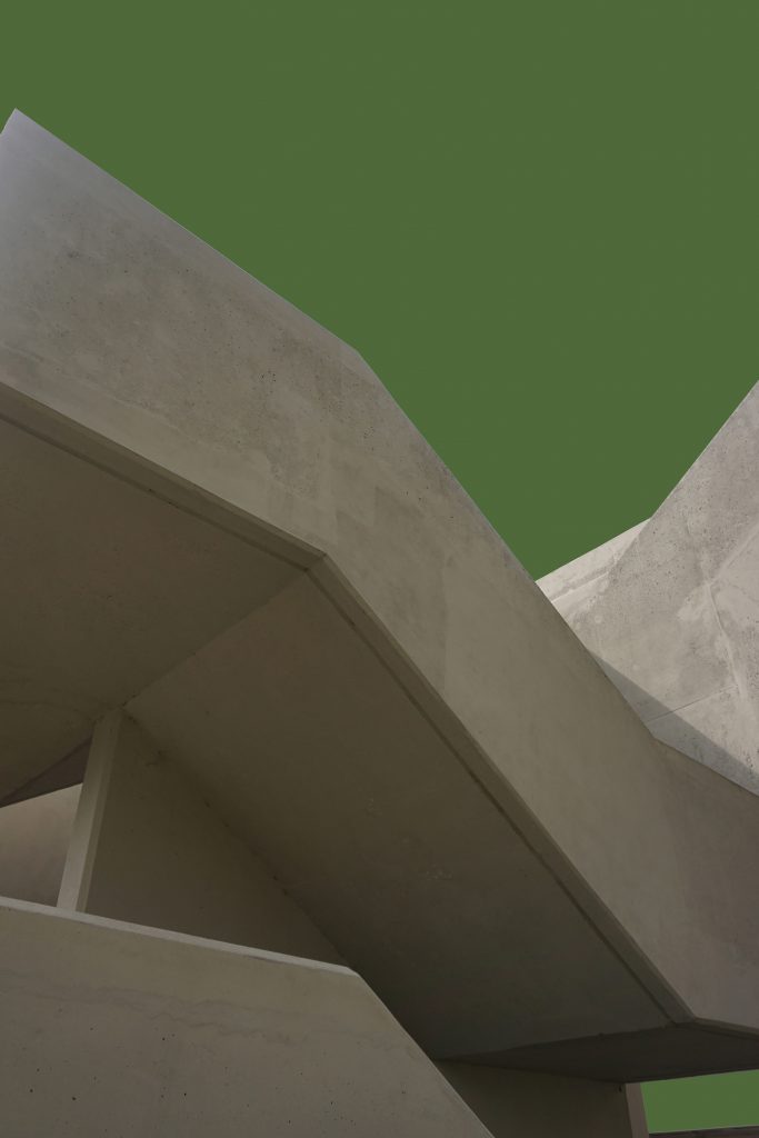 Edward Ray - A concrete staircase on a green background