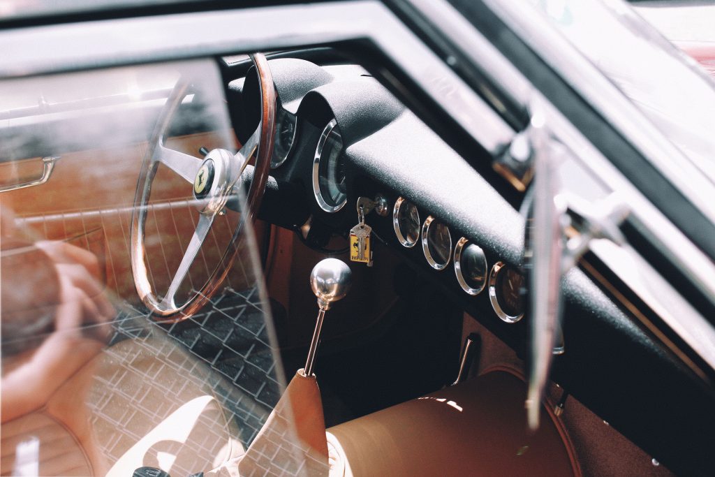 Freya Carlton-Smith - Image of a vintage car interior in subtle sepia tones.